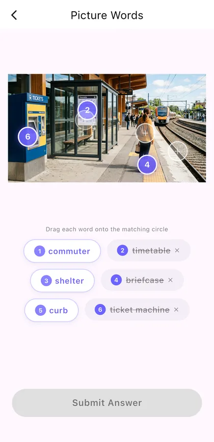 Picture Words game: drag words like commuter and shelter onto a train station photo